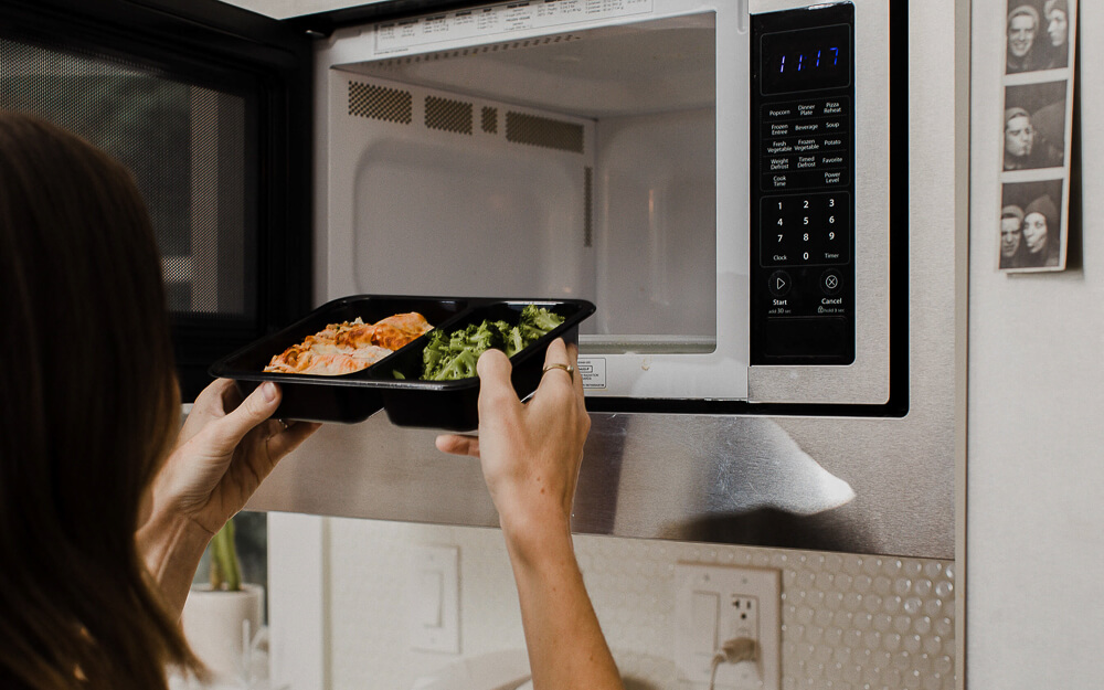 Woman-Microwave-Fresh-Prepared-Meal