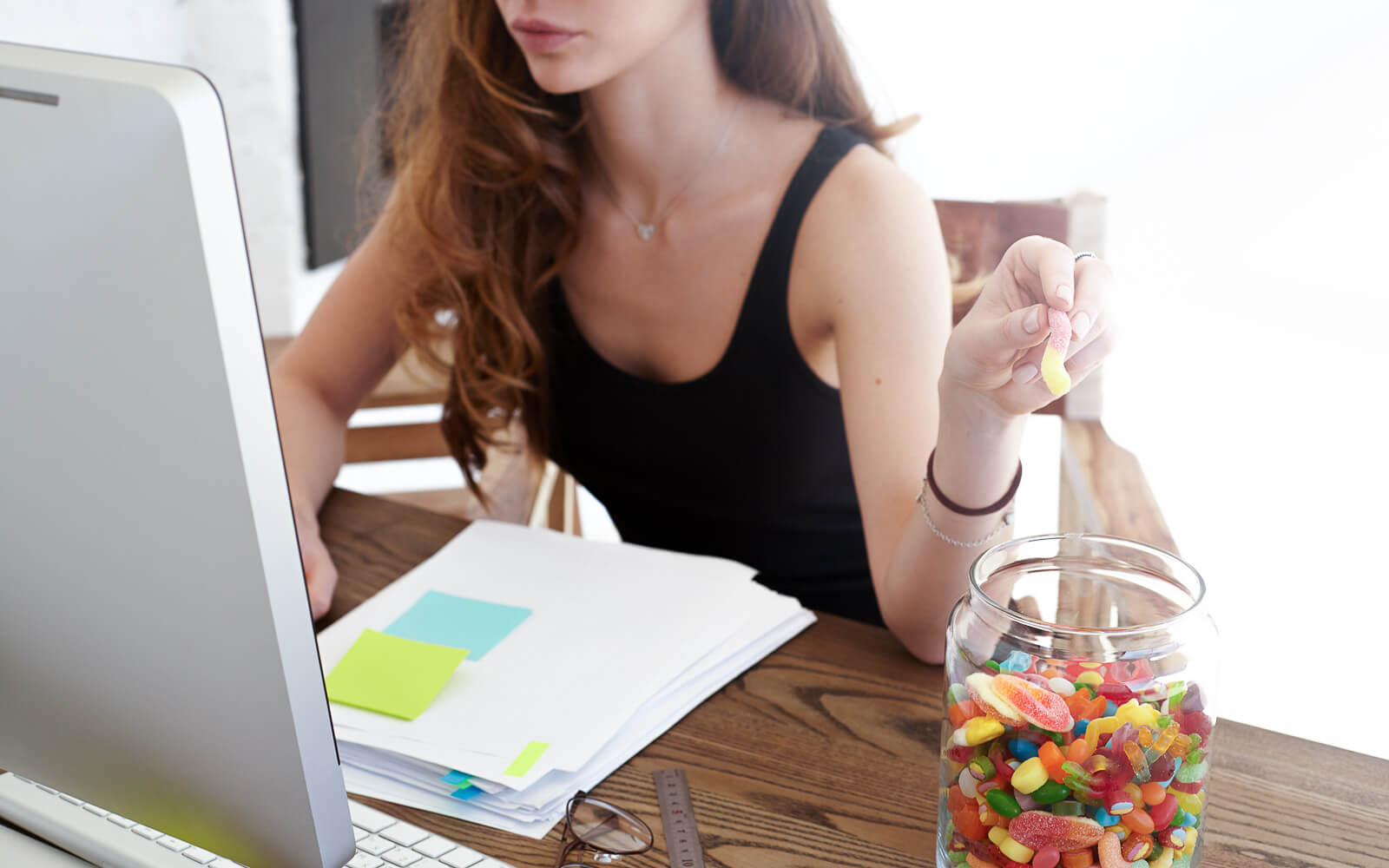 Mindful eating discourages eating while working on your computer or watching TV.