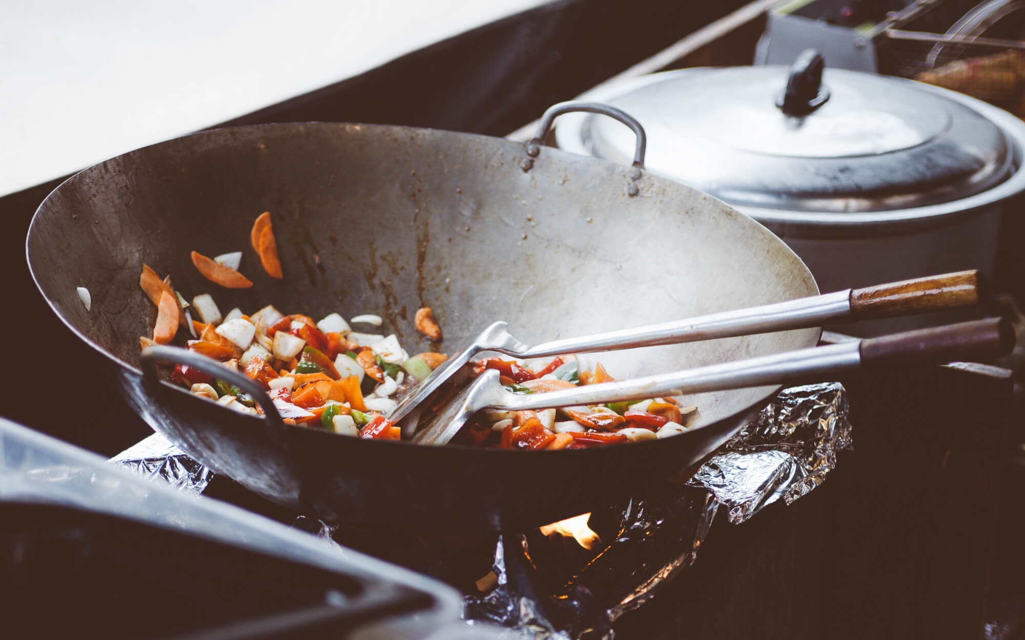 Cooking healthy by stir frying veggies